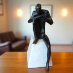 Weight of Thought – Handcrafted Figurine
