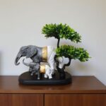 Golden Elegance Elephant Family Showpiece with Artificial Bonsai Tree